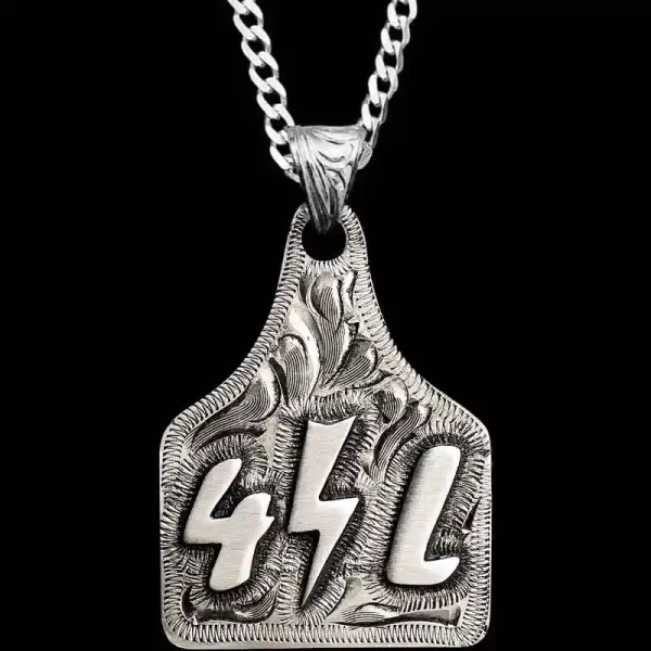Our Mabel Custom Cow Tag is the perfect design to customize with your initials, ranch brand or logo. The hand-engraved, German Silver base is a fantastic blank canvas for any customization. 1.75"" x 1.5""

Customize it with any